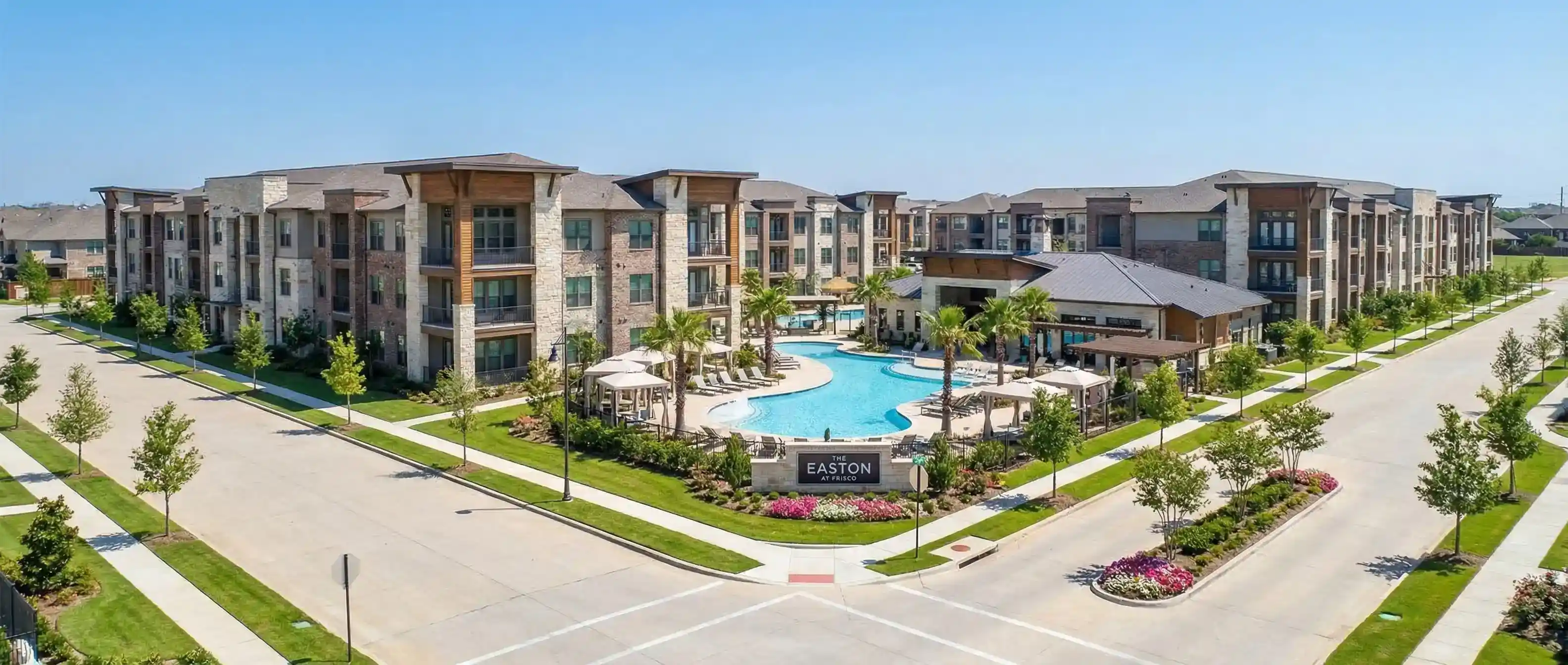 New apartment community in Frisco-Plano area with resort-style amenities and green space