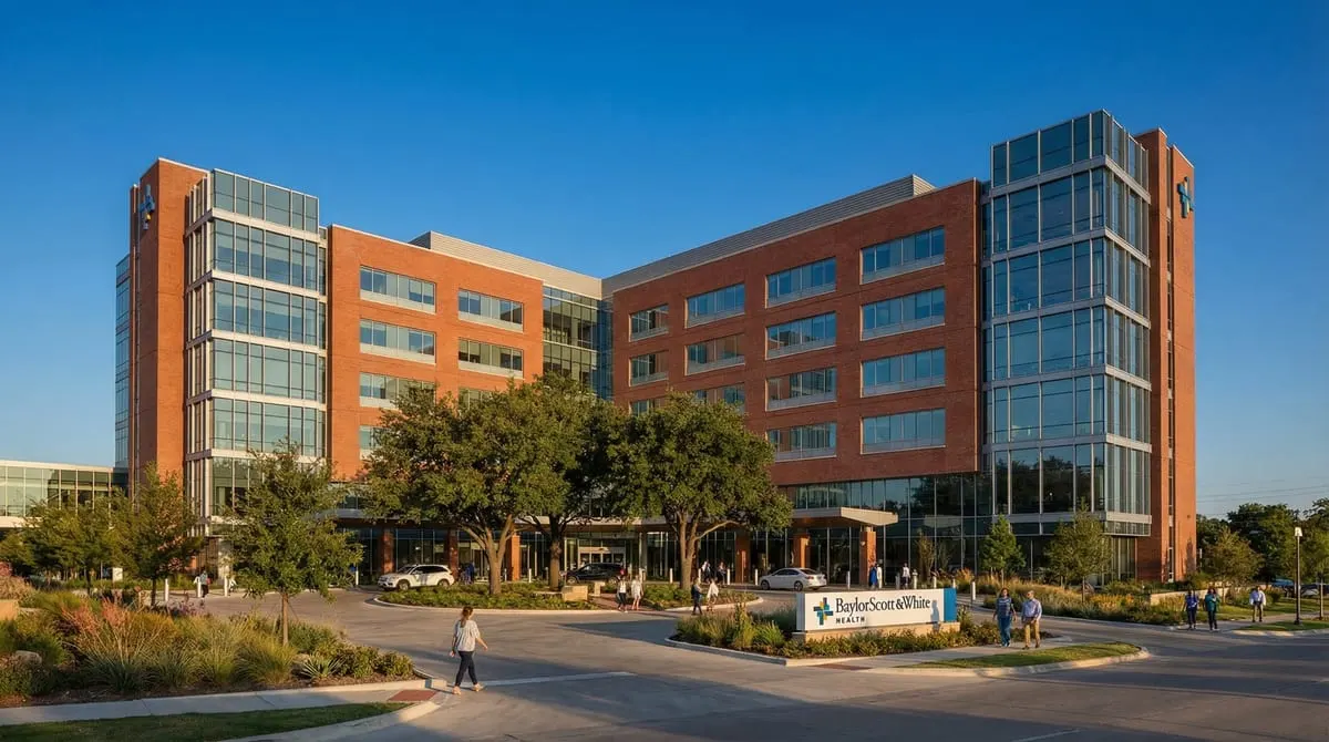 Baylor University Medical Center exterior in East Dallas showing the Baylor Scott and White Health campus with red brick and glass facade