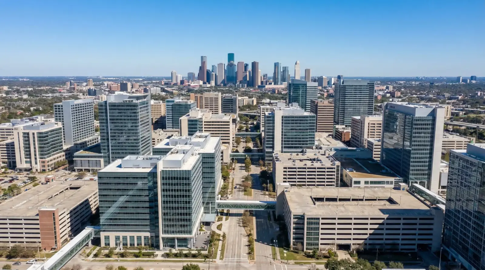 Texas Medical Center Houston aerial view showing the world's largest medical complex with downtown Houston skyline in background